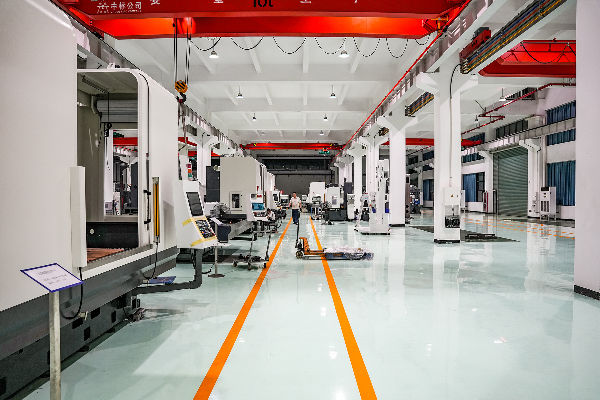 Advanced manufacturing workshop with CNC grinding equipment